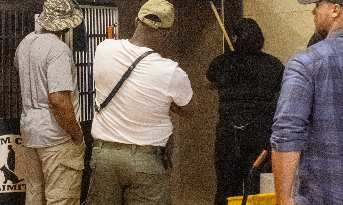 kennel maintenance students learning to conduct kennel maintenance
