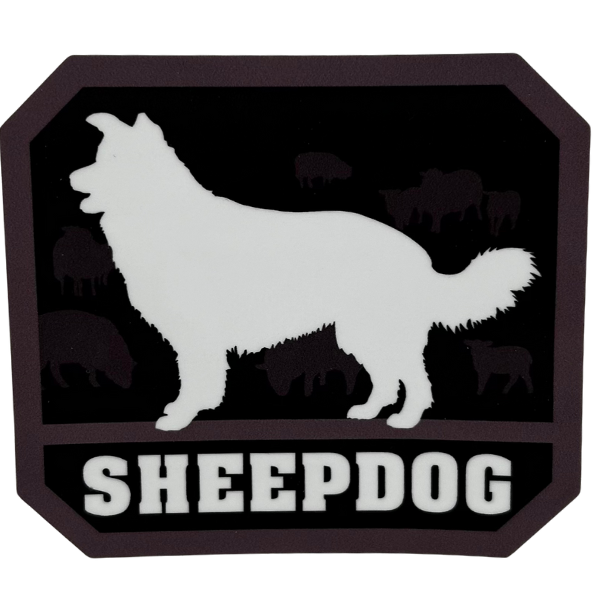 A sticker with a dark background and white silhouette of a herding dog with the word "SHEEPDOG" in bold white font.