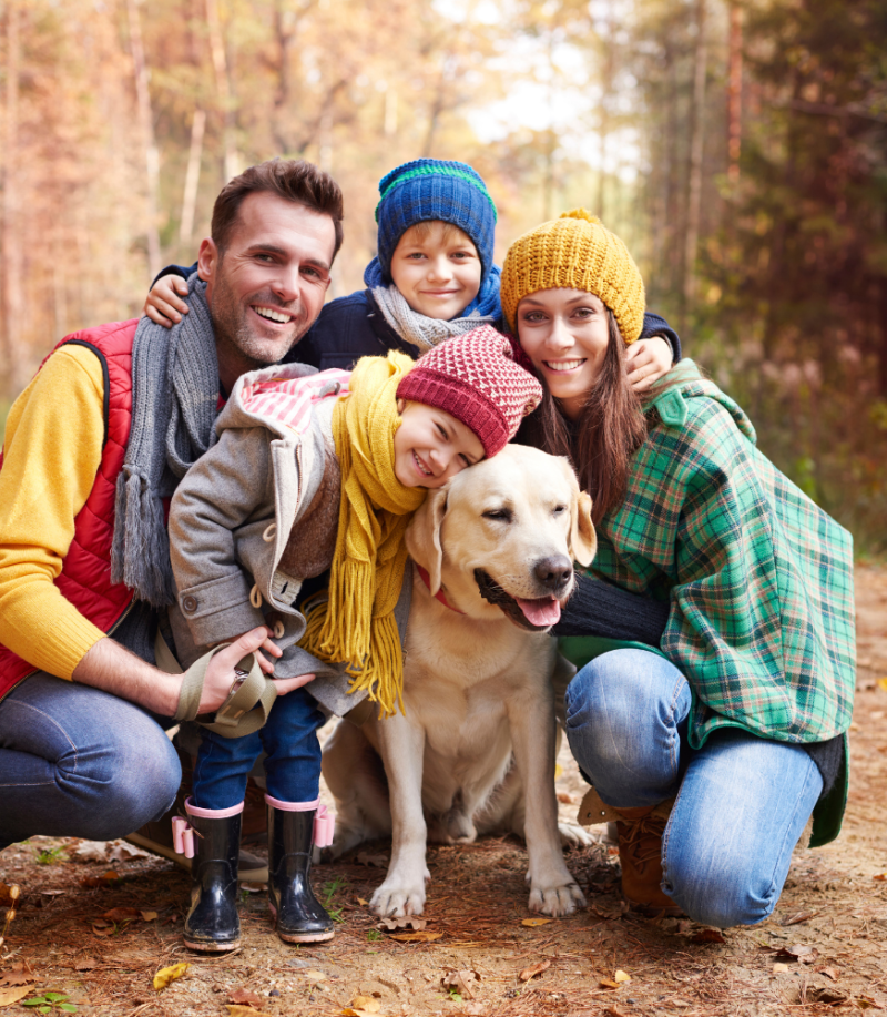 Happy Family With Their Dog Happy Family With Their Dog